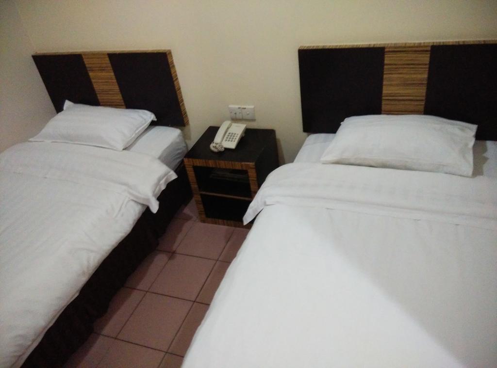 Hotel Traveller Кота-Кинабалу Экстерьер фото