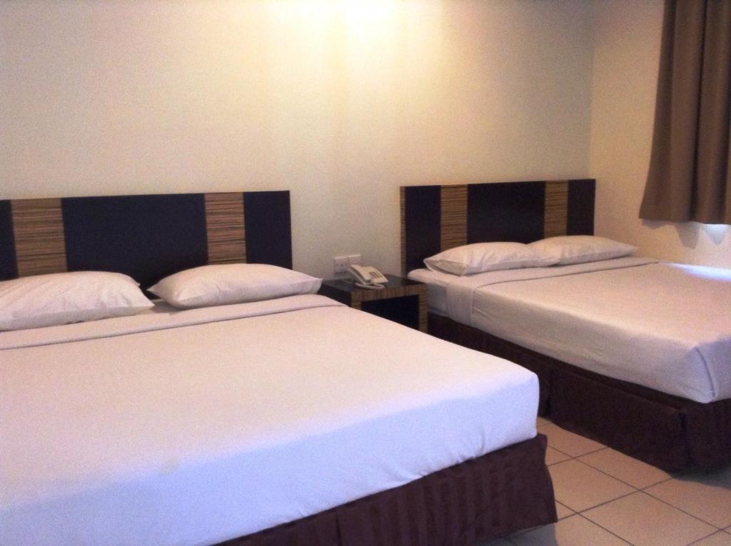 Hotel Traveller Кота-Кинабалу Номер фото